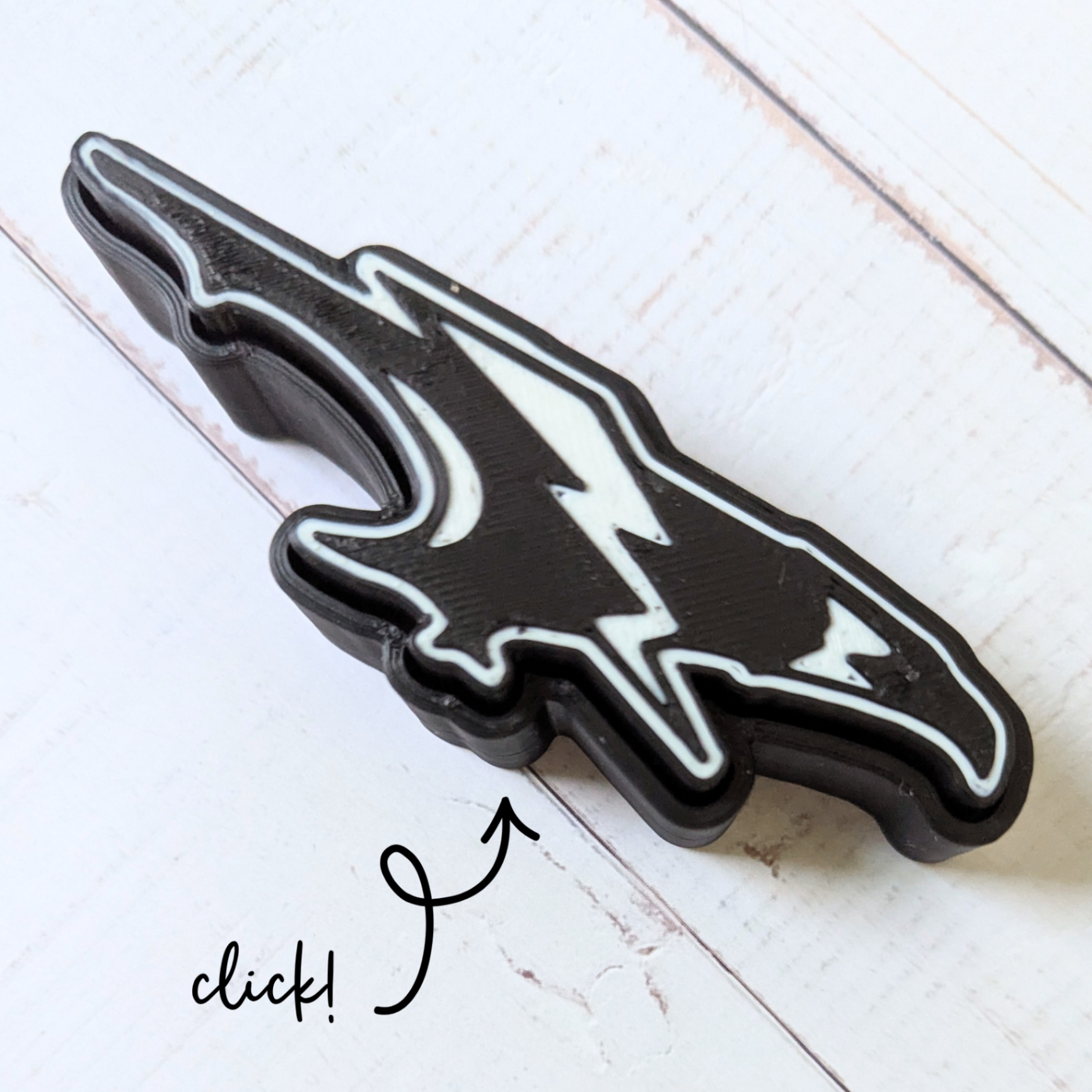 Finished custom 3D-printed Clicker fidget toy shaped like the Edsel Ford High School Thunderbird mascot